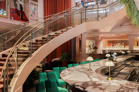 Bar and grand stair at Tiger Lilly on 400 Colorado